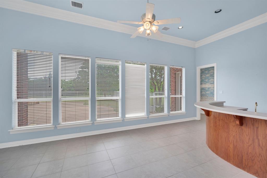 6420 Hayes Road Midlothian, TX 76065 - Photo 25 of 40 Sun room off kitchen with bar