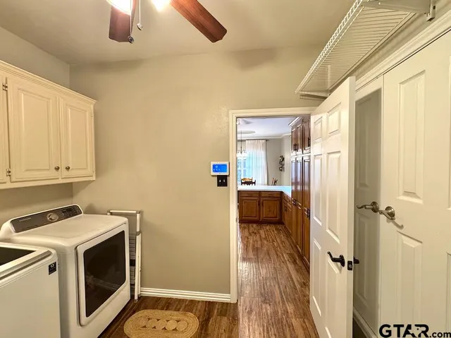 a utility room with dryer and washer