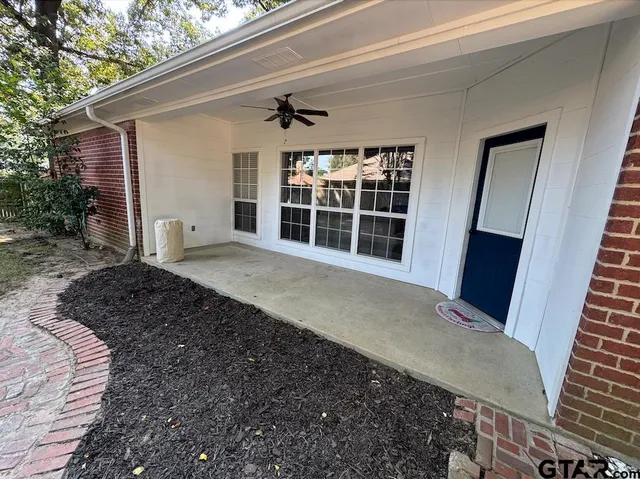 a view of house with front door