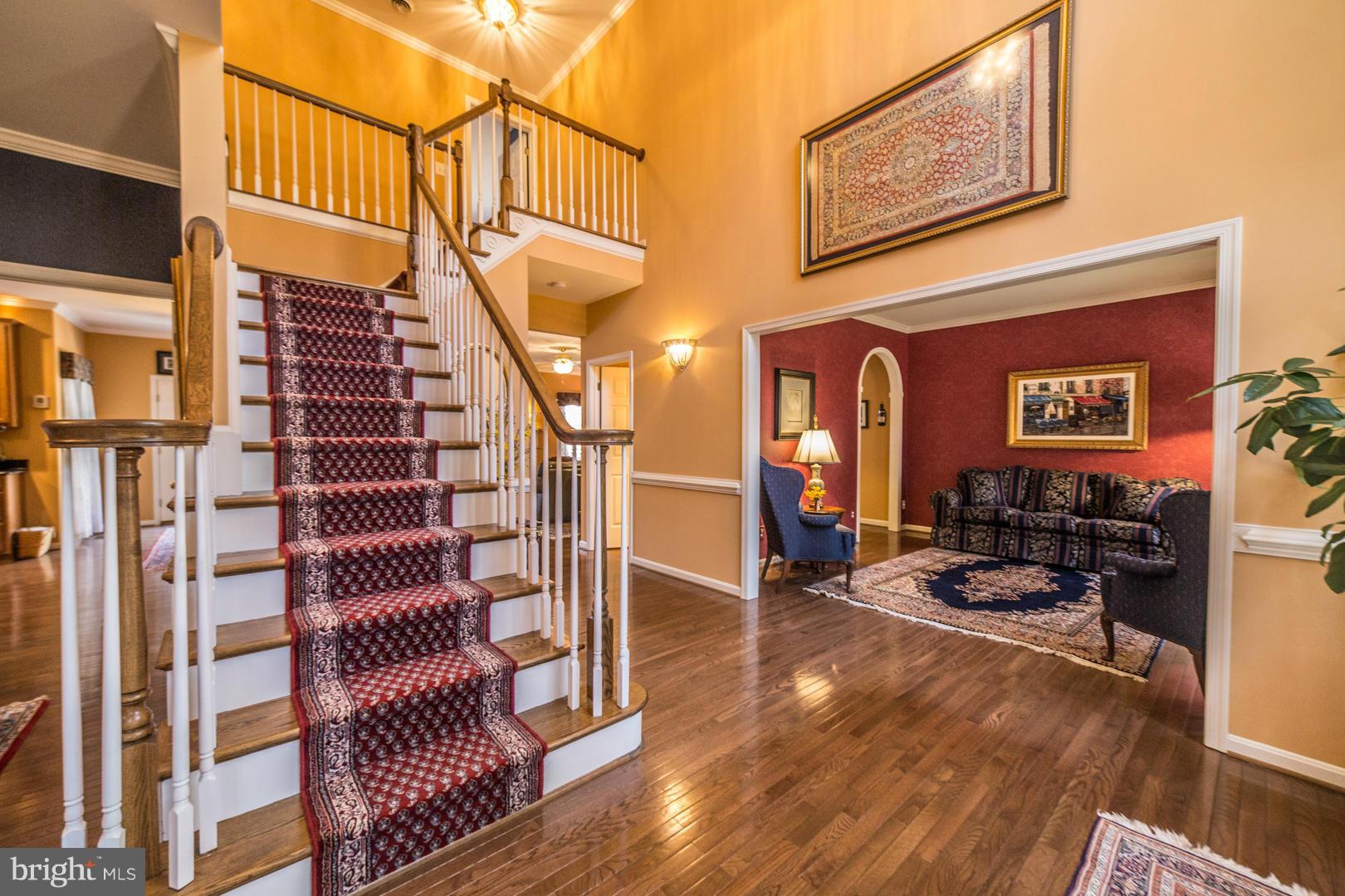7 Beaver Ridge Road Stafford, VA 22556 - Photo 4 of 30 Two story foyer with wood staircase