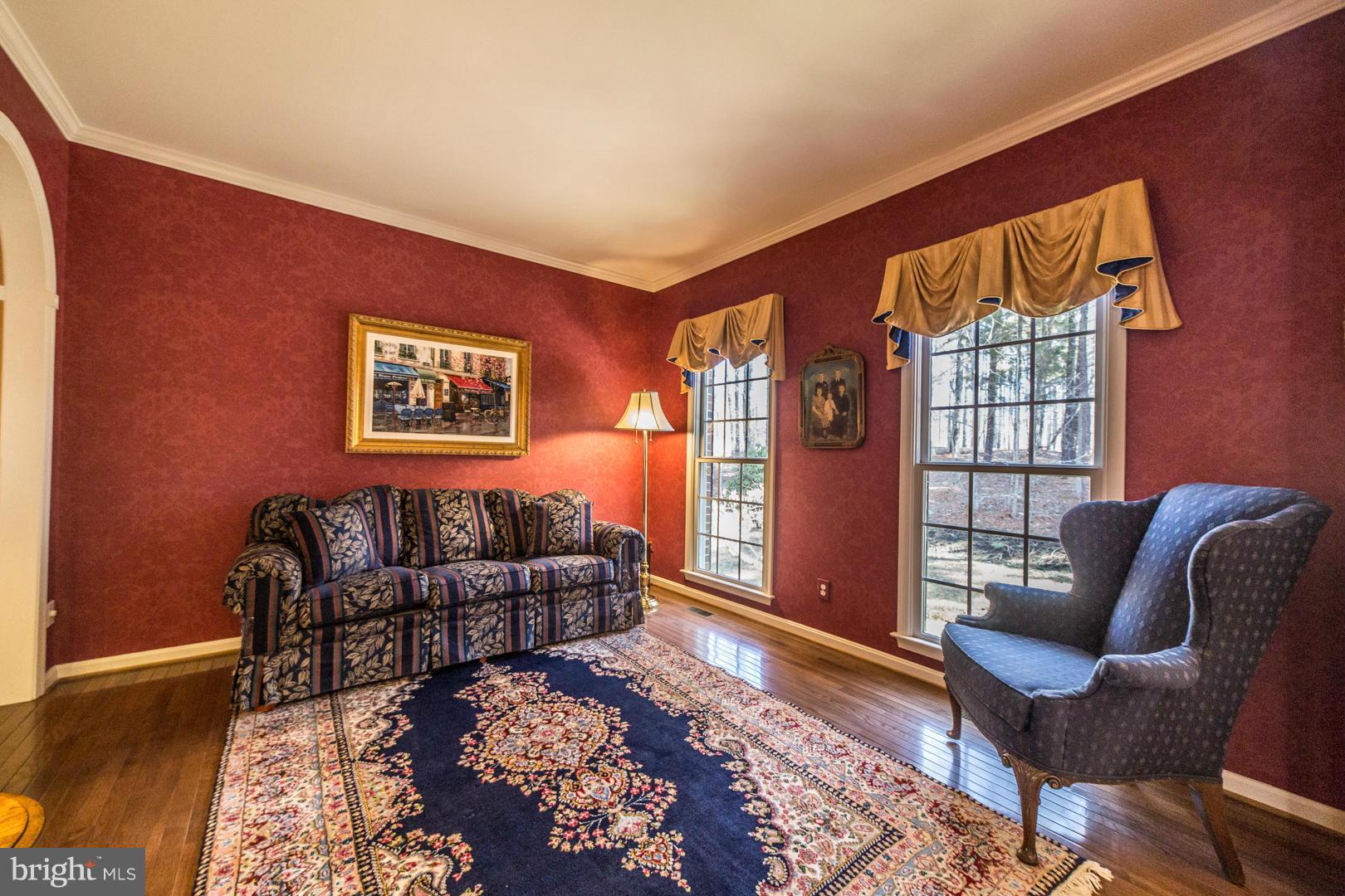 7 Beaver Ridge Road Stafford, VA 22556 - Photo 5 of 30 Living Room with wood floors & crown molding