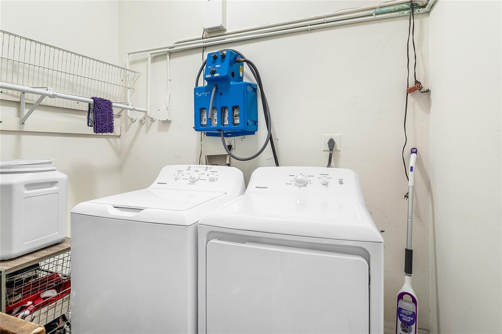 9661 Carousel Circle South Boca Raton, FL 33434 - Photo 21 of 25 a utility room with dryer and washer