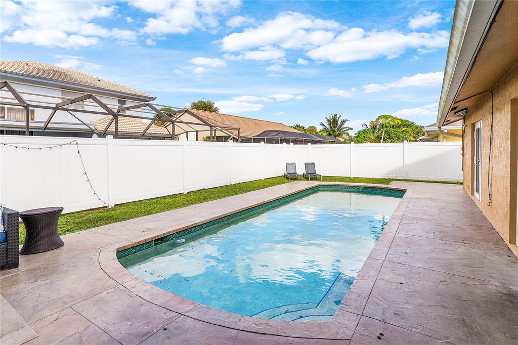 9661 Carousel Circle South Boca Raton, FL 33434 - Photo 24 of 25 a view of swimming pool with an outdoor seating