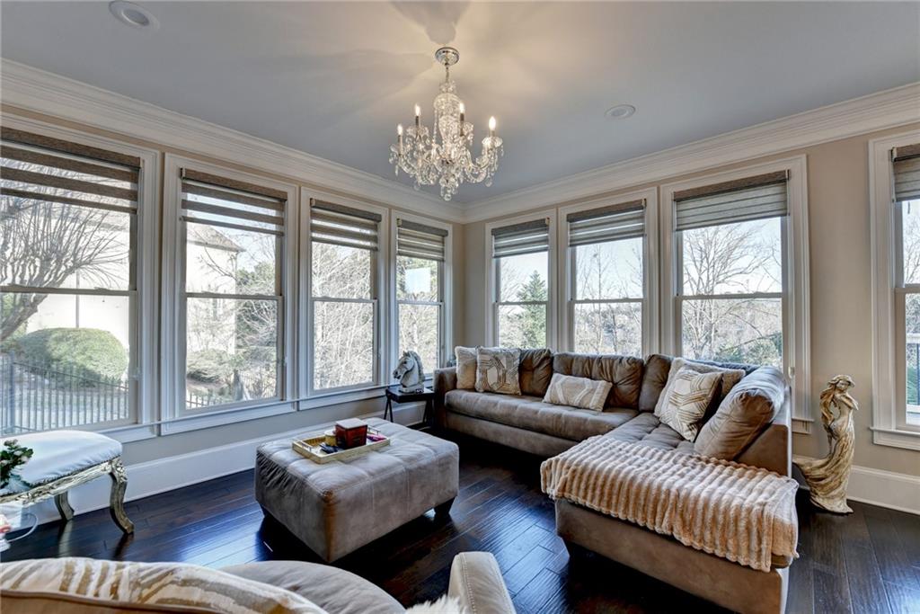 8360 Kenningston Way Duluth, GA 30097 - Photo 21 of 54 a living room with furniture and a large window