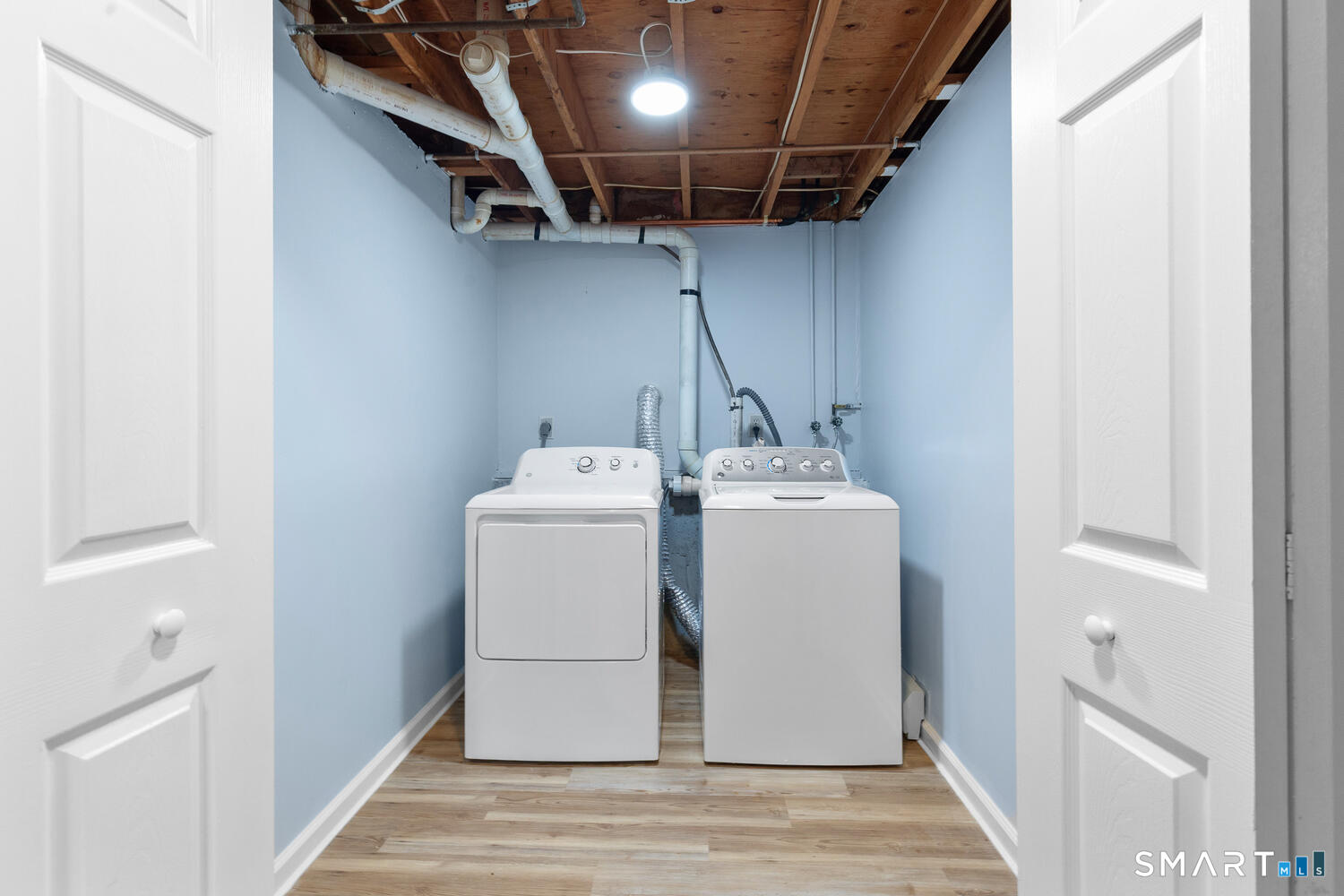 33 Deer Ridge Road Stonington, CT 06378 - Photo 16 of 25 a utility room with dryer and washer