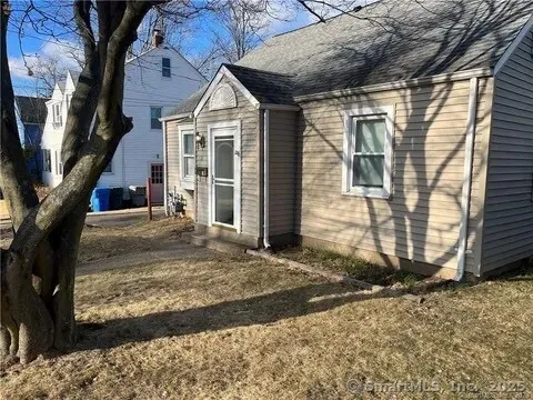a view of a back yard of the house
