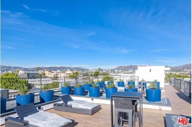 a picture of city view with outdoor seating and city view