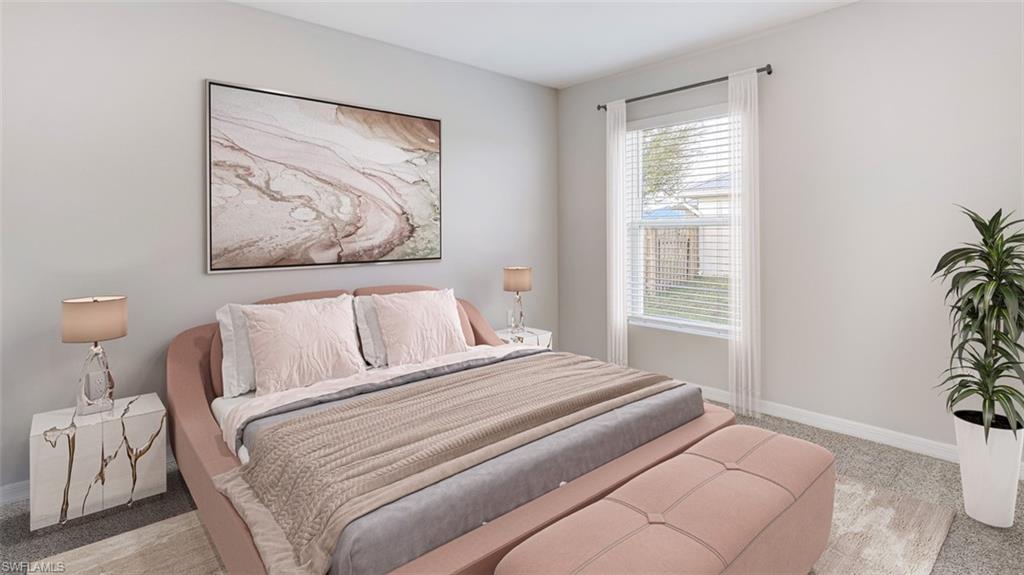3504 25th Street Southwest Lehigh Acres, FL 33976 - Photo 6 of 10 a bedroom with a bed and a window