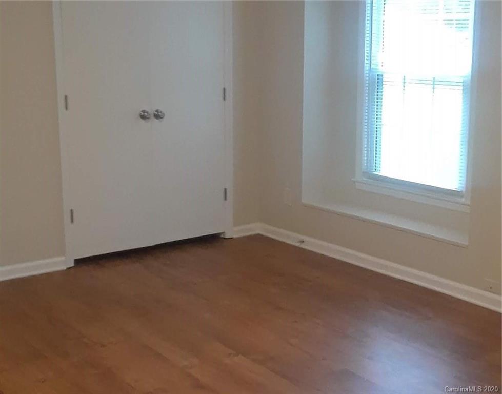 8009 Wynnview Road Indian Trail, NC 28079 - Photo 5 of 10 an empty room with a window