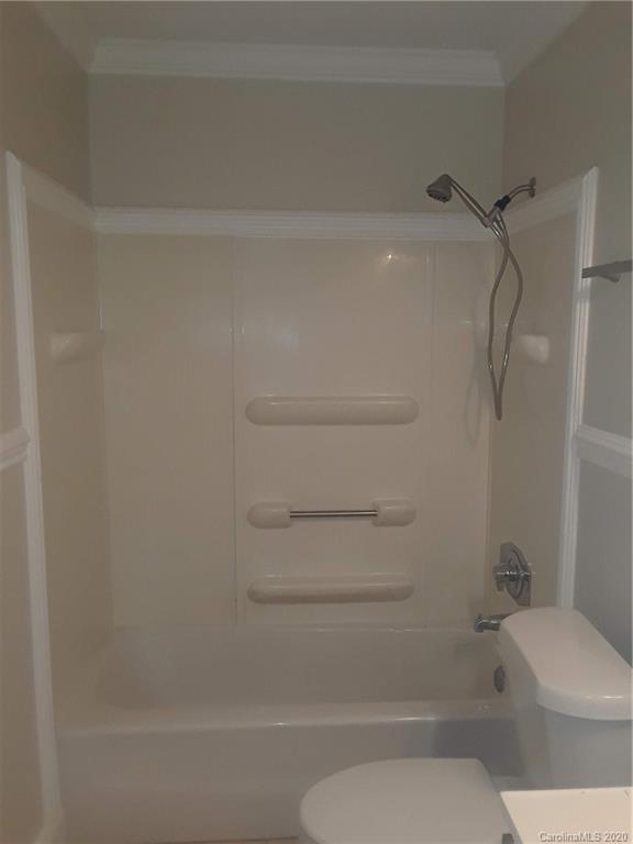 8009 Wynnview Road Indian Trail, NC 28079 - Photo 10 of 10 a bathroom with a toilet and a shower