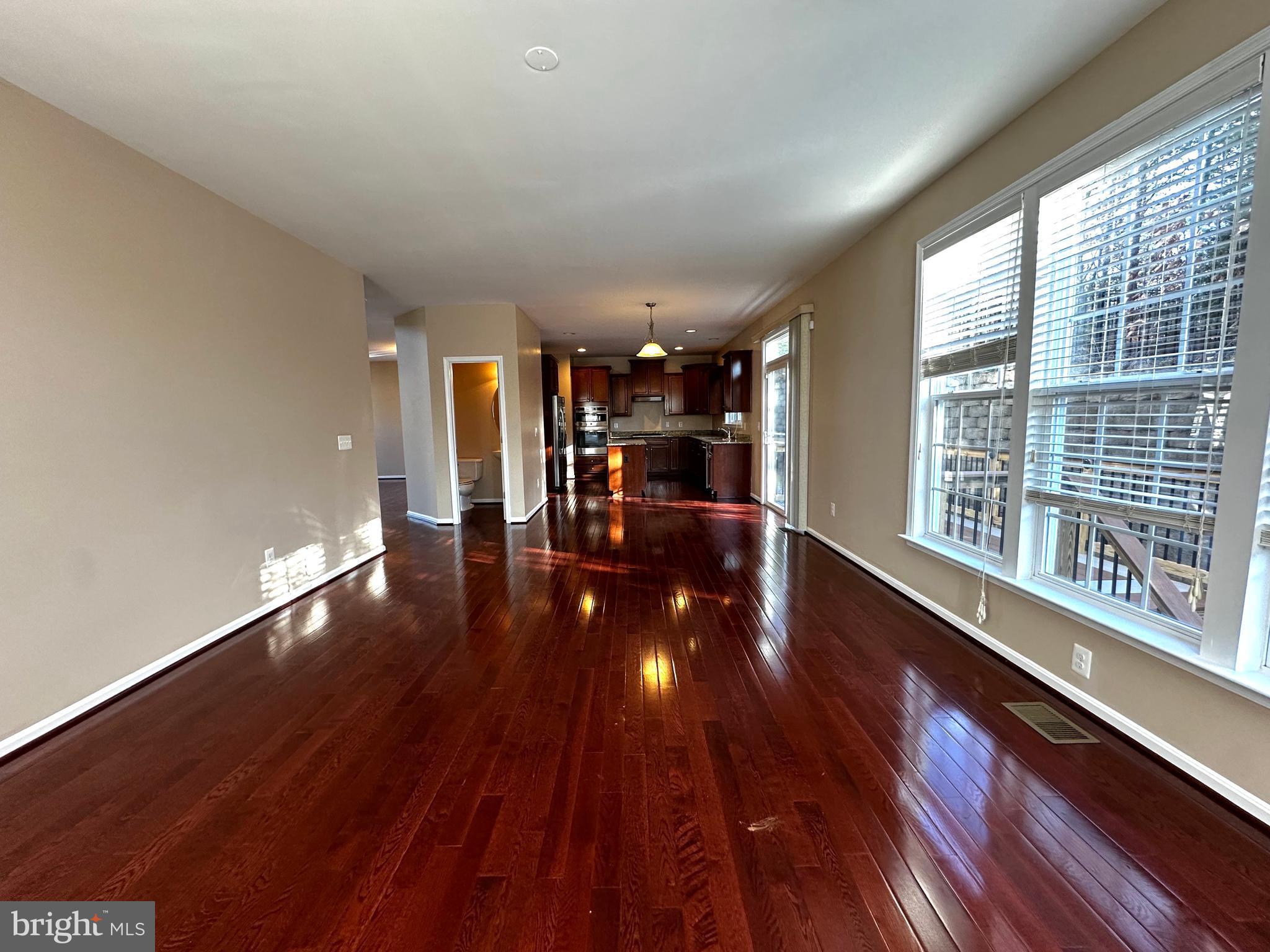 15165 Santander Drive Gainesville, VA 20155 - Photo 16 of 35 a view of a room with wooden floor