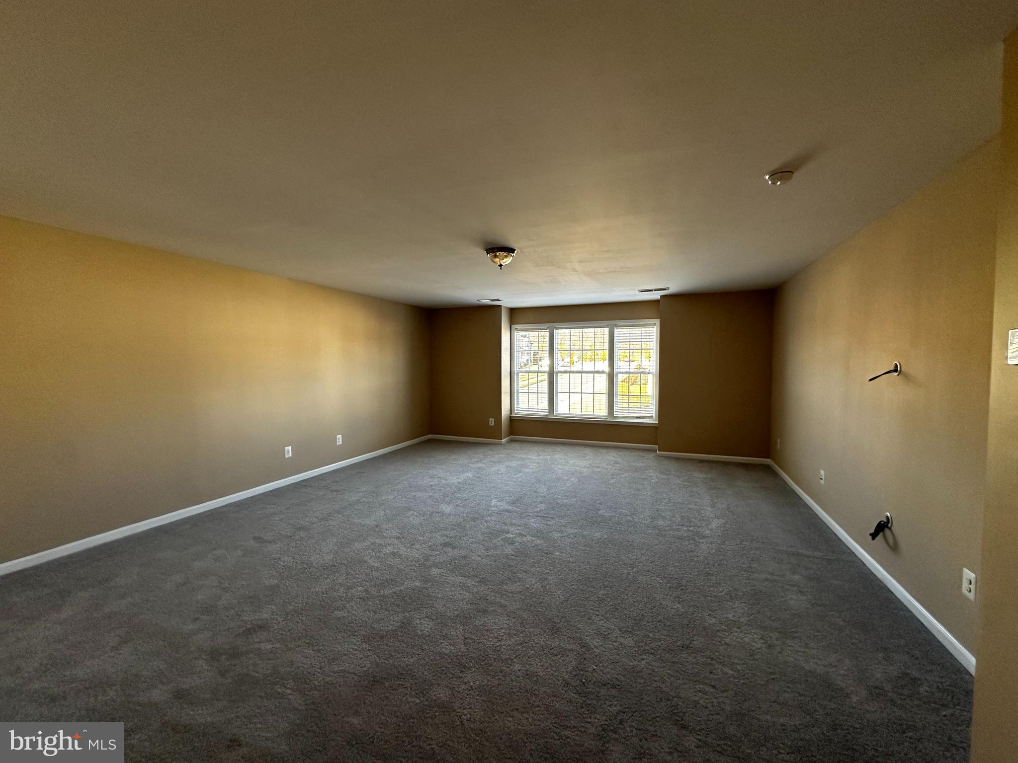 15165 Santander Drive Gainesville, VA 20155 - Photo 20 of 35 a view of an empty room with a window