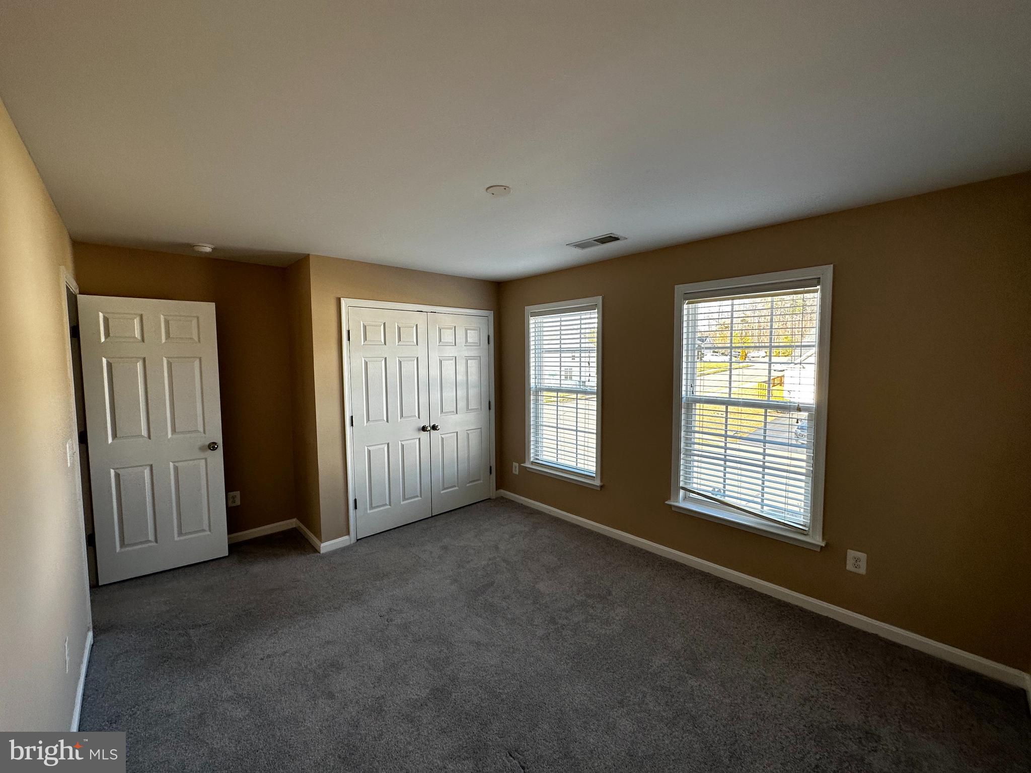 15165 Santander Drive Gainesville, VA 20155 - Photo 28 of 35 an empty room with windows
