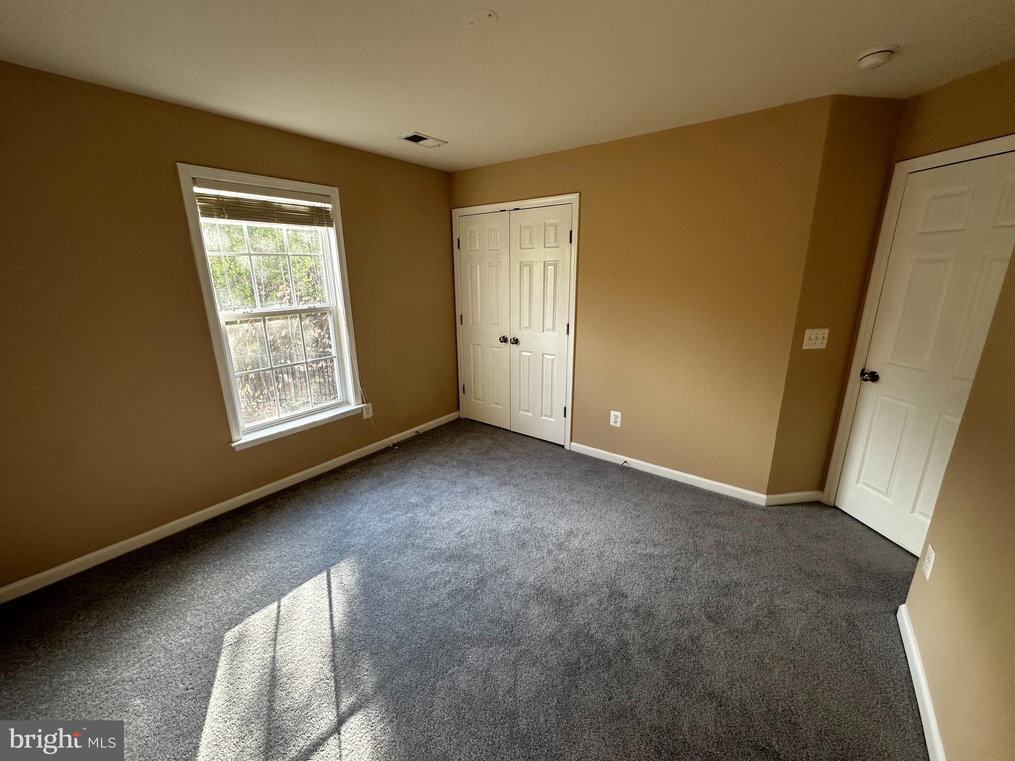 15165 Santander Drive Gainesville, VA 20155 - Photo 30 of 35 an empty room with windows