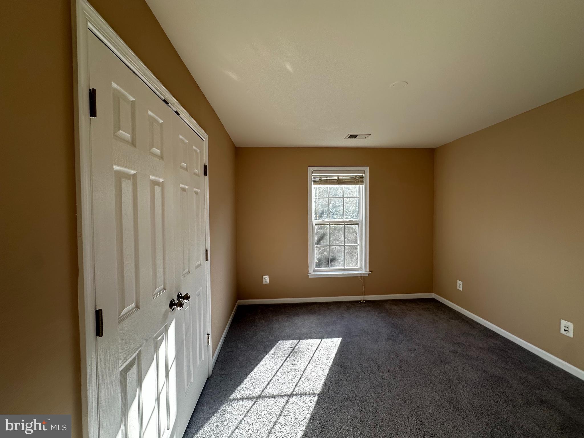 15165 Santander Drive Gainesville, VA 20155 - Photo 32 of 35 an empty room with windows