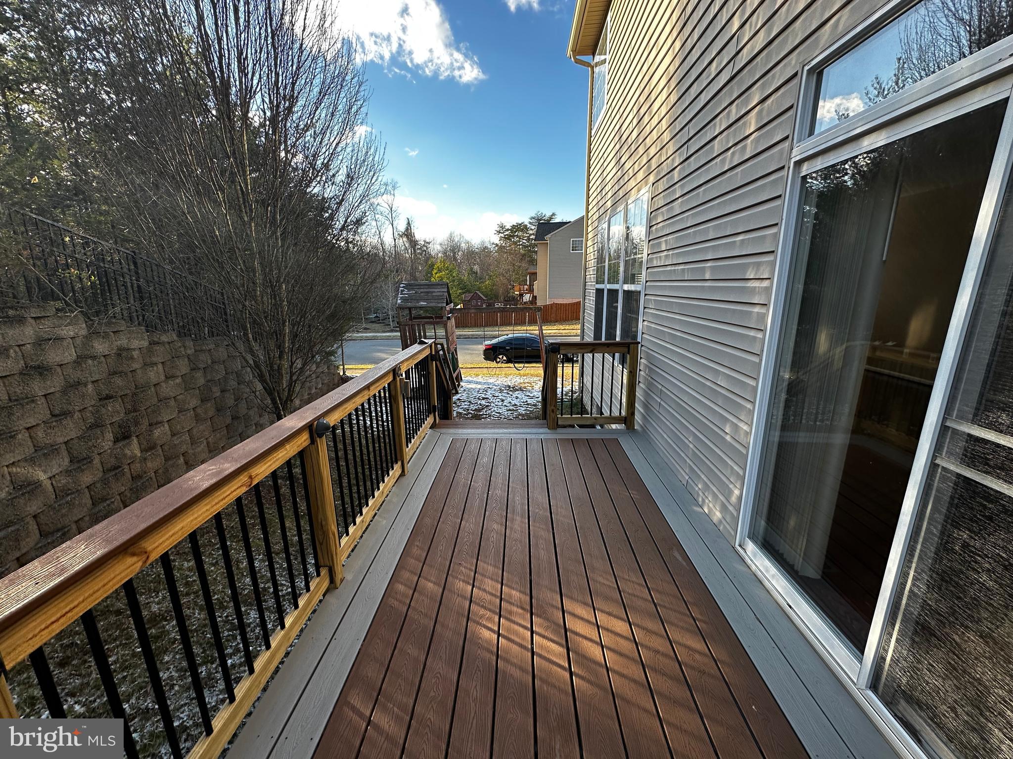 15165 Santander Drive Gainesville, VA 20155 - Photo 33 of 35 a view of balcony with wooden floor and outdoor space