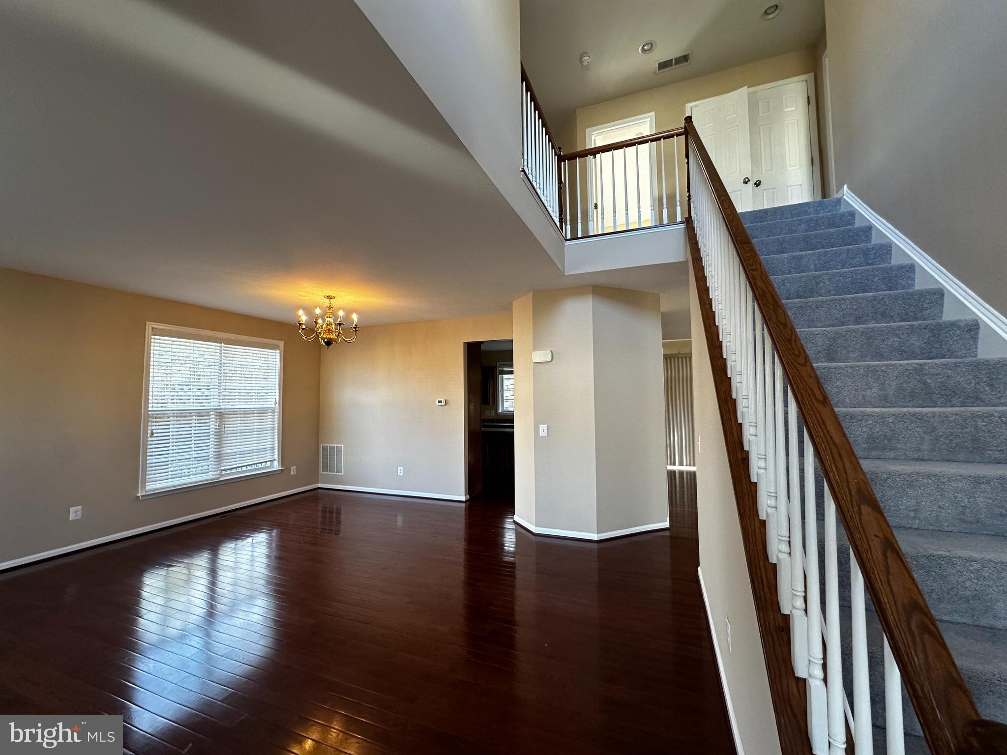 15165 Santander Drive Gainesville, VA 20155 - Photo 6 of 35 a view of an entryway with wooden floor