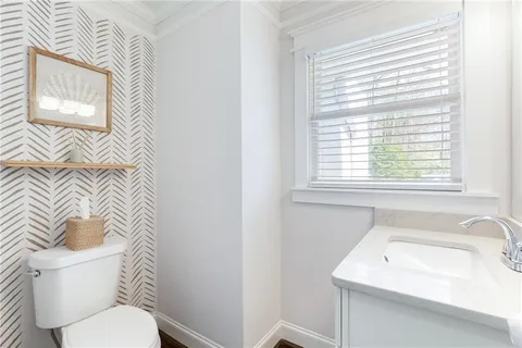 a bathroom with a sink and a toilet