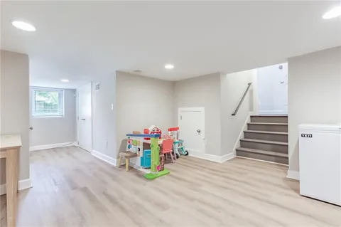 a view of livingroom with furniture and stairs
