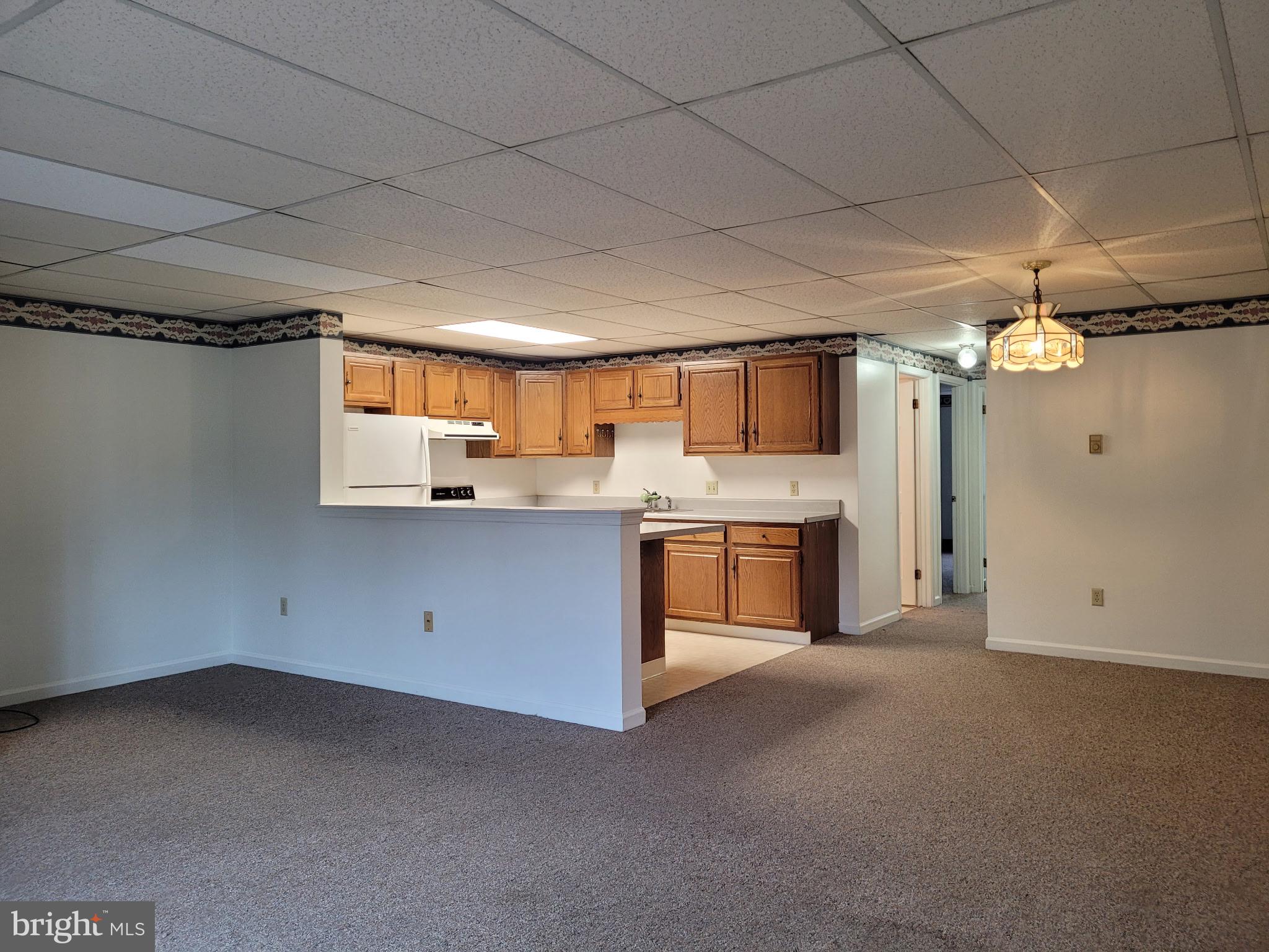 119 Hamilton Avenue Waynesboro, PA 17268 - Photo 3 of 12 a kitchen with a sink cabinets and window