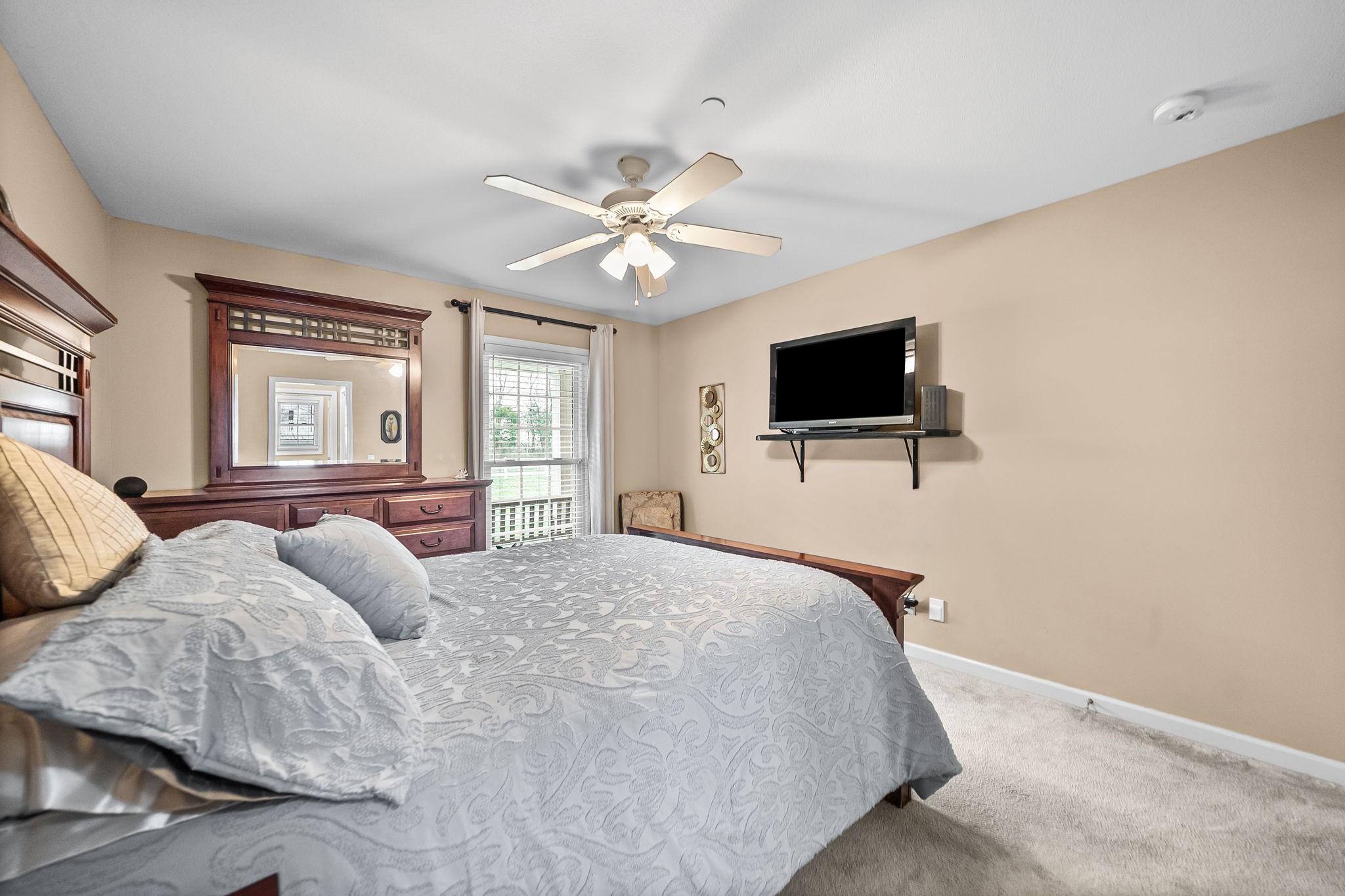 207 Bailey Lane, Unit 102 Pleasant View, TN 37146 - Photo 12 of 30 a bedroom with bed tv and window