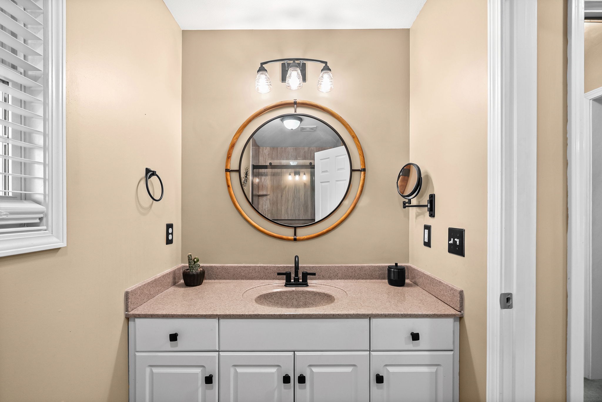 207 Bailey Lane, Unit 102 Pleasant View, TN 37146 - Photo 14 of 30 a bathroom with a sink and a mirror