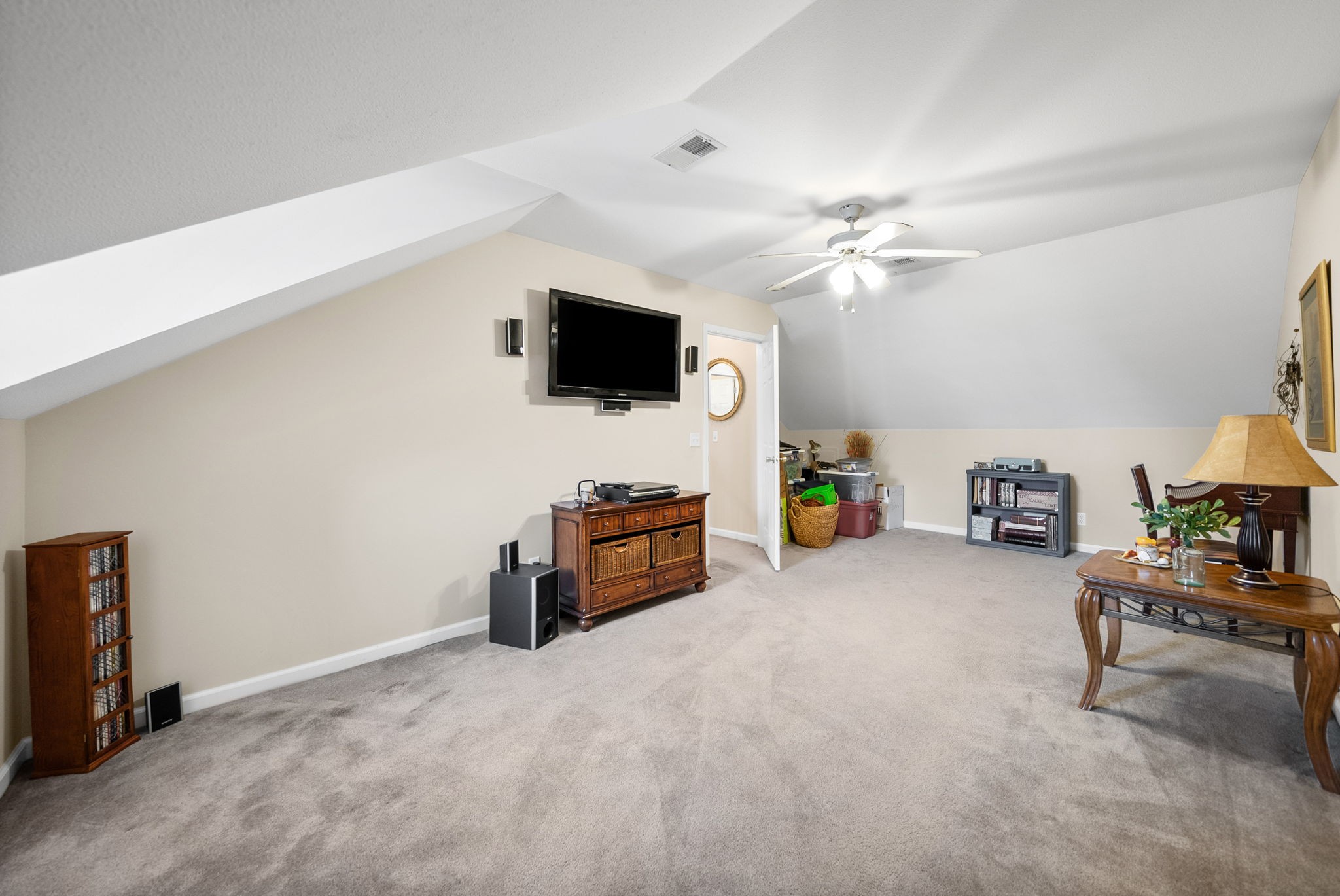 207 Bailey Lane, Unit 102 Pleasant View, TN 37146 - Photo 21 of 30 a living room with furniture and a flat screen tv