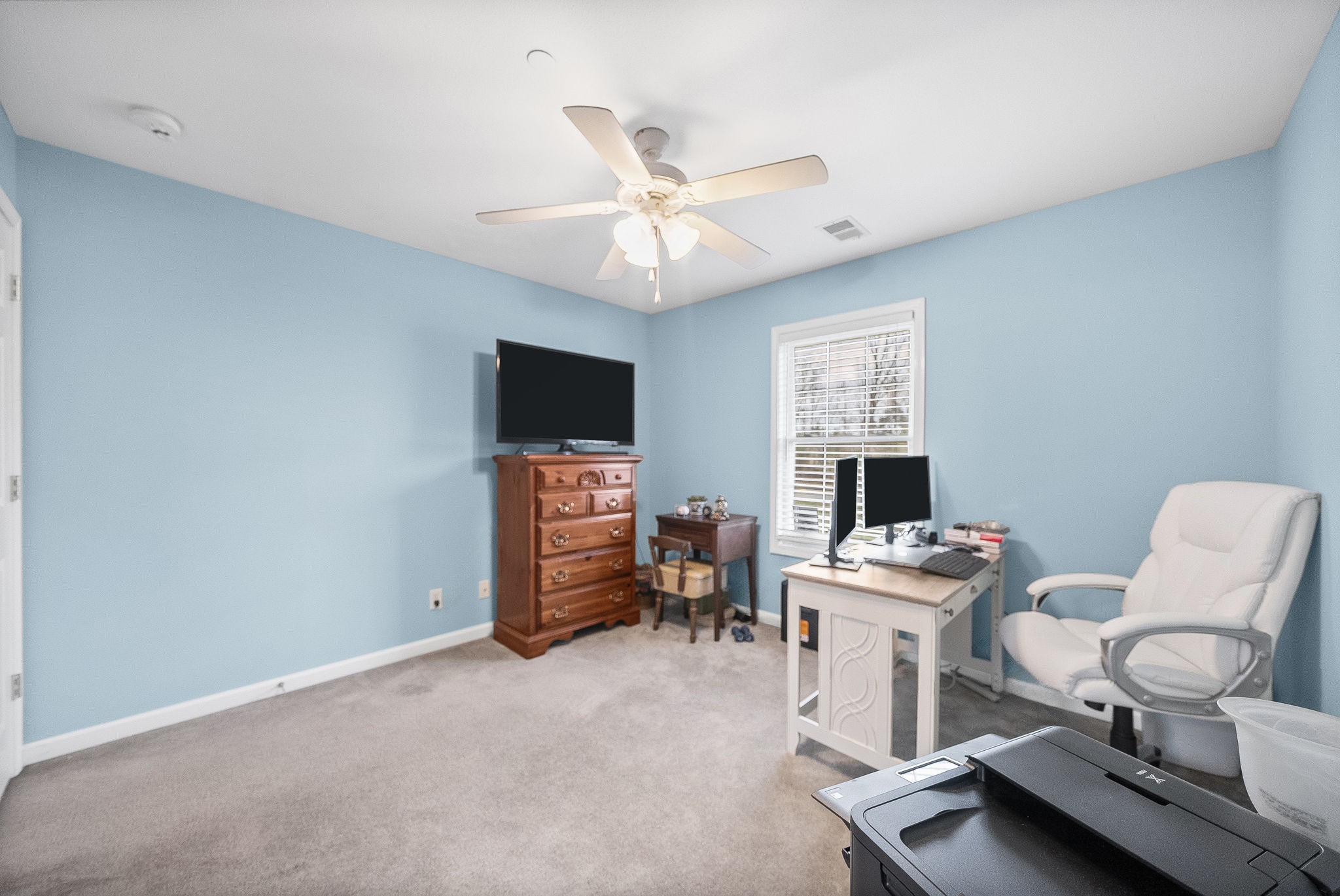 207 Bailey Lane, Unit 102 Pleasant View, TN 37146 - Photo 23 of 30 a room with furniture and a flat screen tv