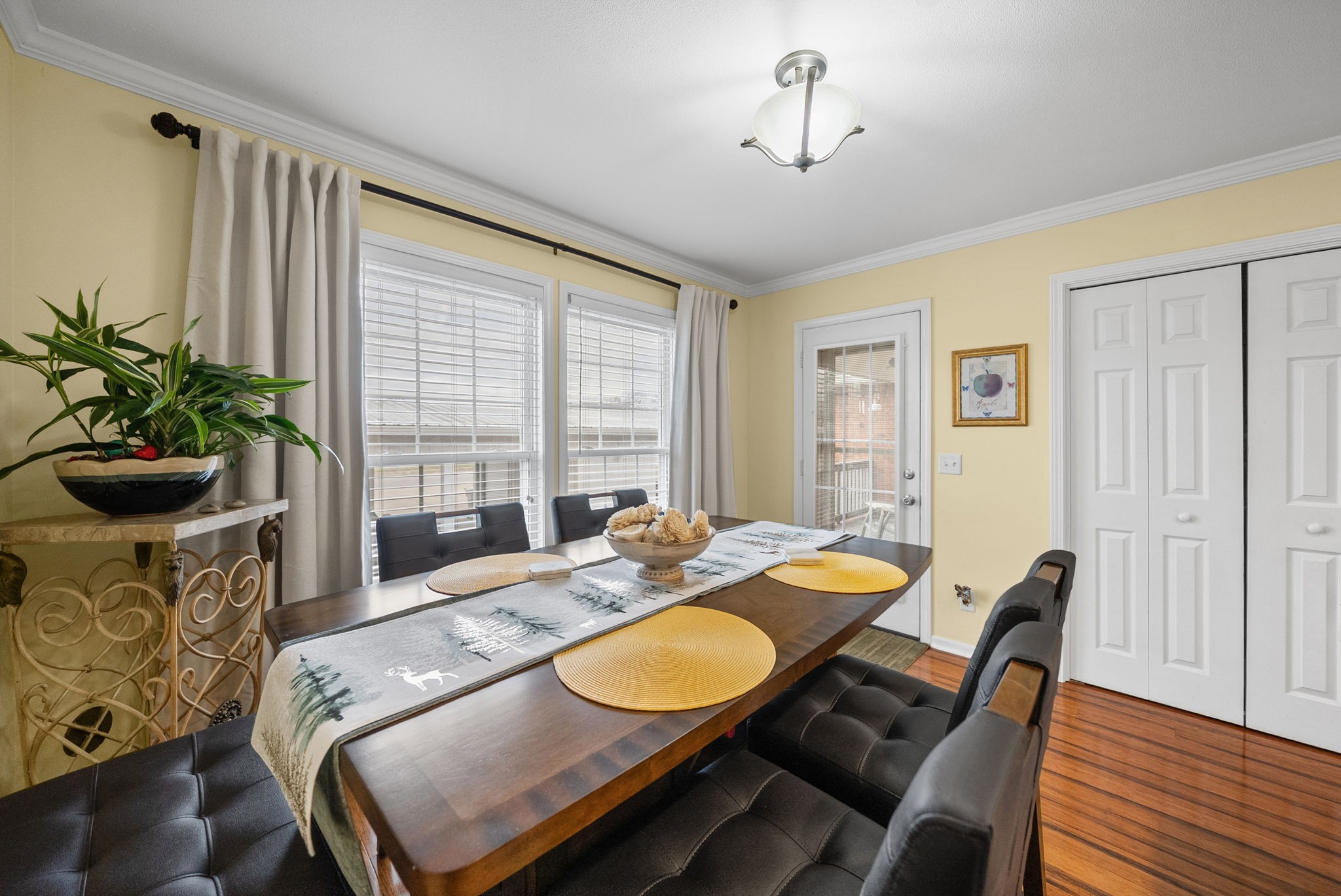 207 Bailey Lane, Unit 102 Pleasant View, TN 37146 - Photo 4 of 30 a dining room with furniture and wooden floor