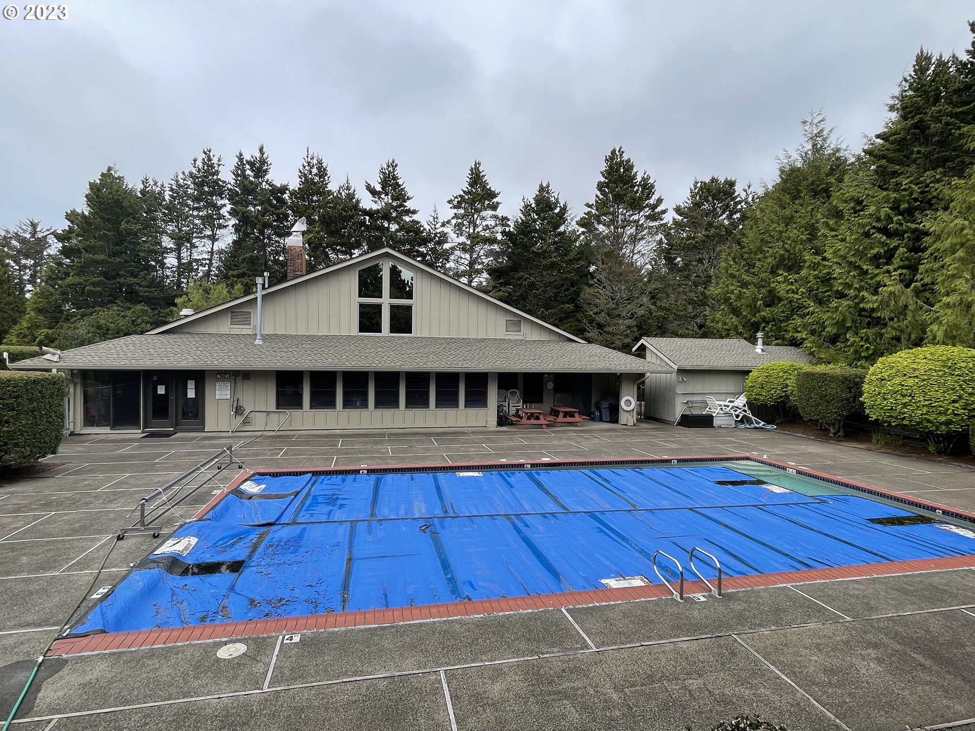 Seagrove Loop Lincoln City, OR 97367 - Photo 9 of 10 a view of a house with a swimming pool