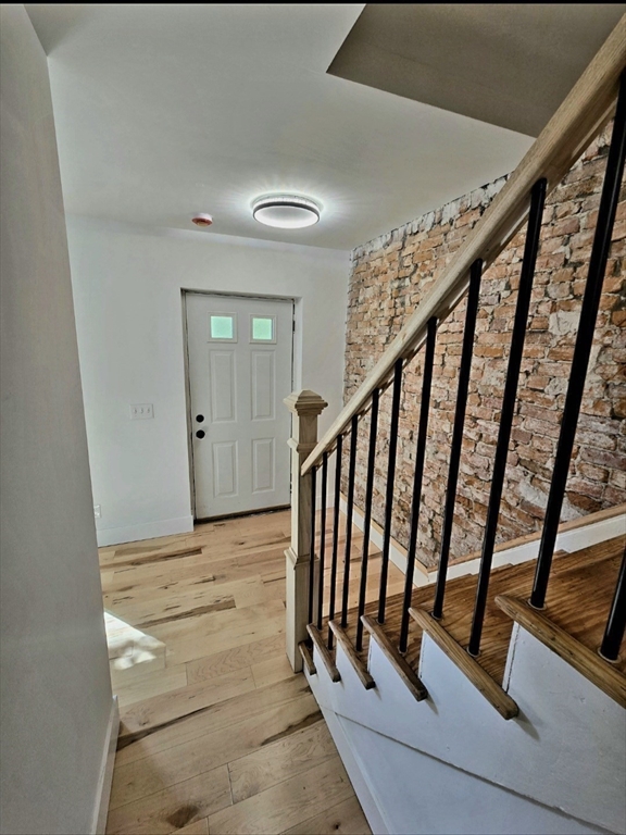 321 Riverside Drive Northampton, MA 01062 - Photo 11 of 24 a view of an entryway with wooden floor