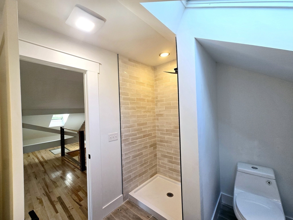 321 Riverside Drive Northampton, MA 01062 - Photo 21 of 24 a bathroom with a glass shower door