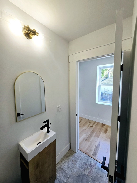 321 Riverside Drive Northampton, MA 01062 - Photo 5 of 24 a bathroom with a sink and a mirror