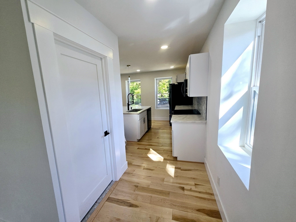 321 Riverside Drive Northampton, MA 01062 - Photo 6 of 24 a view of a living room with a fireplace