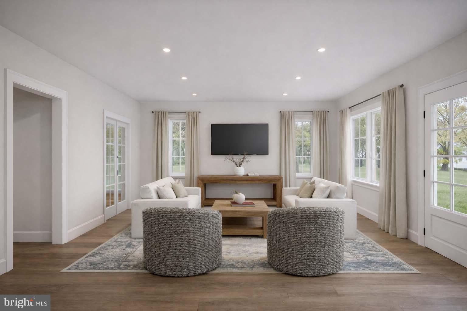 780 West Cedarville Road Pottstown, PA 19465 - Photo 3 of 8 a living room with furniture and a flat screen tv