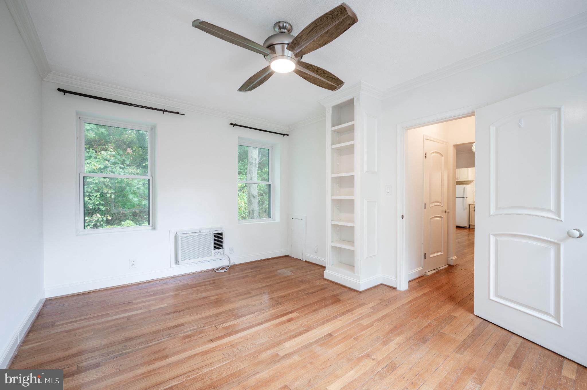 3719 12th Street Northeast, Unit 209 Washington, DC 20017 - Photo 14 of 24 Peaceful, spacious bedroom with more built-ins.
