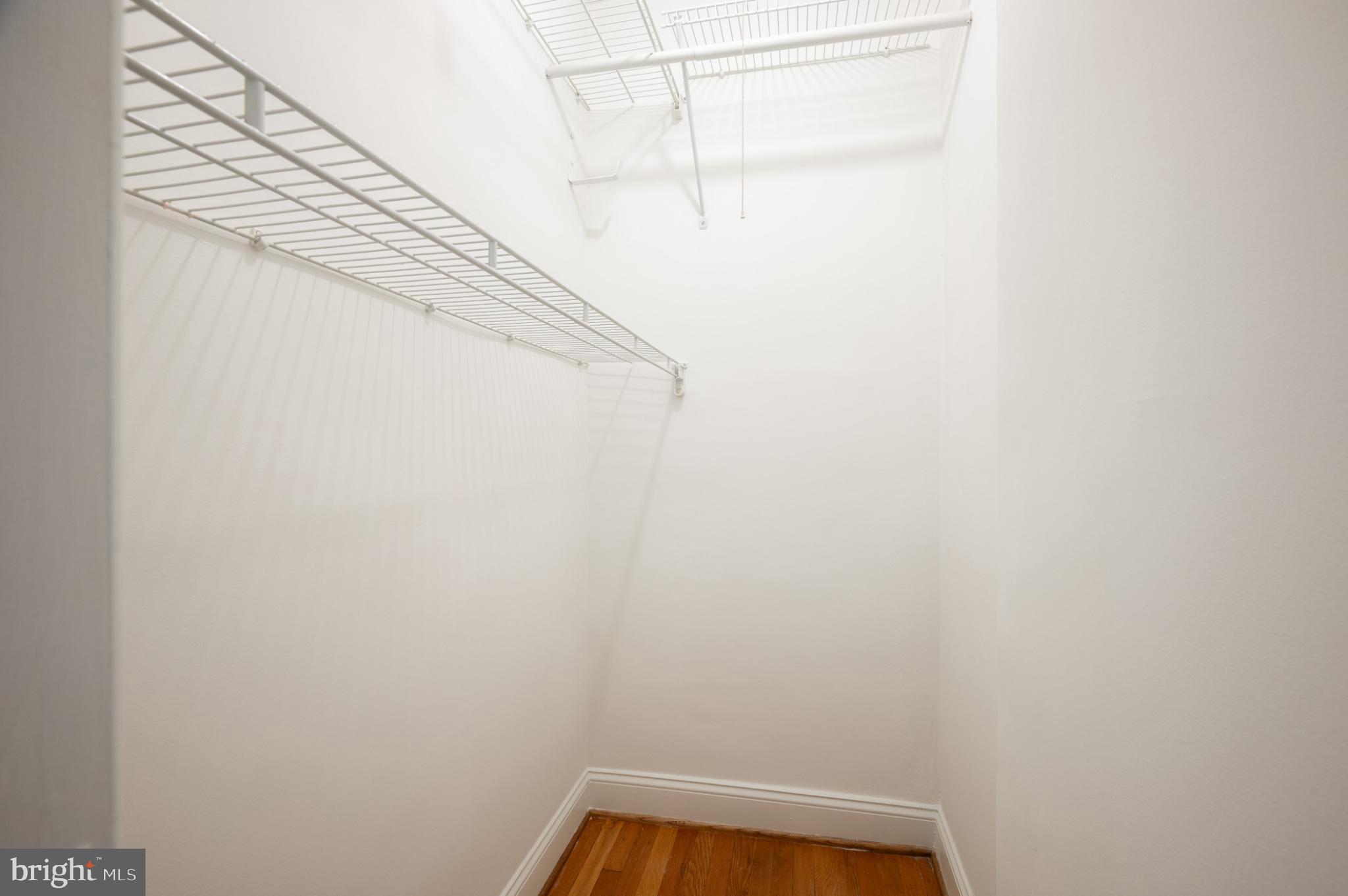 3719 12th Street Northeast, Unit 209 Washington, DC 20017 - Photo 17 of 24 Bonus walk-in closet with shelving.