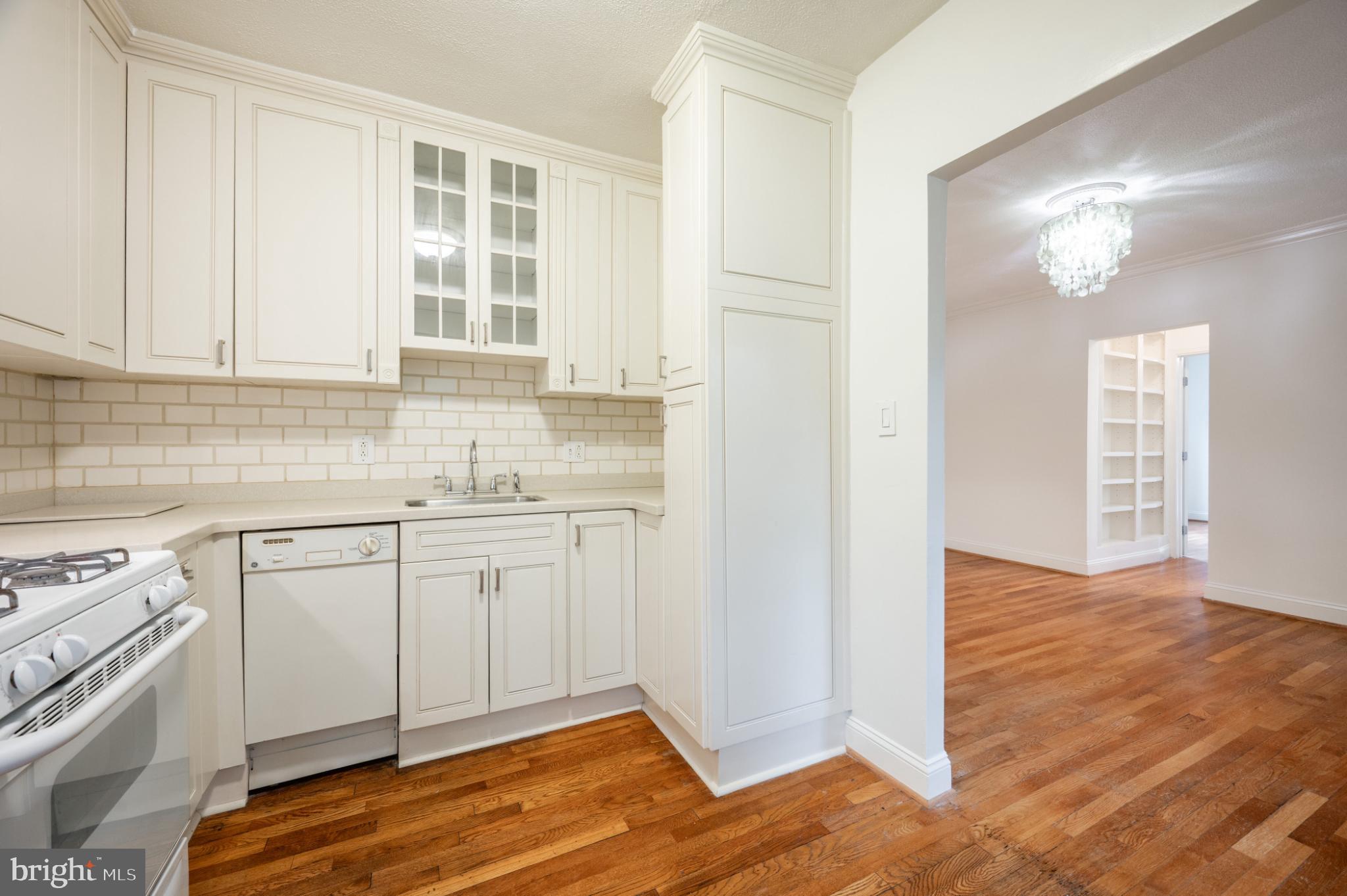 3719 12th Street Northeast, Unit 209 Washington, DC 20017 - Photo 8 of 24 Kitchen looking towards living room.