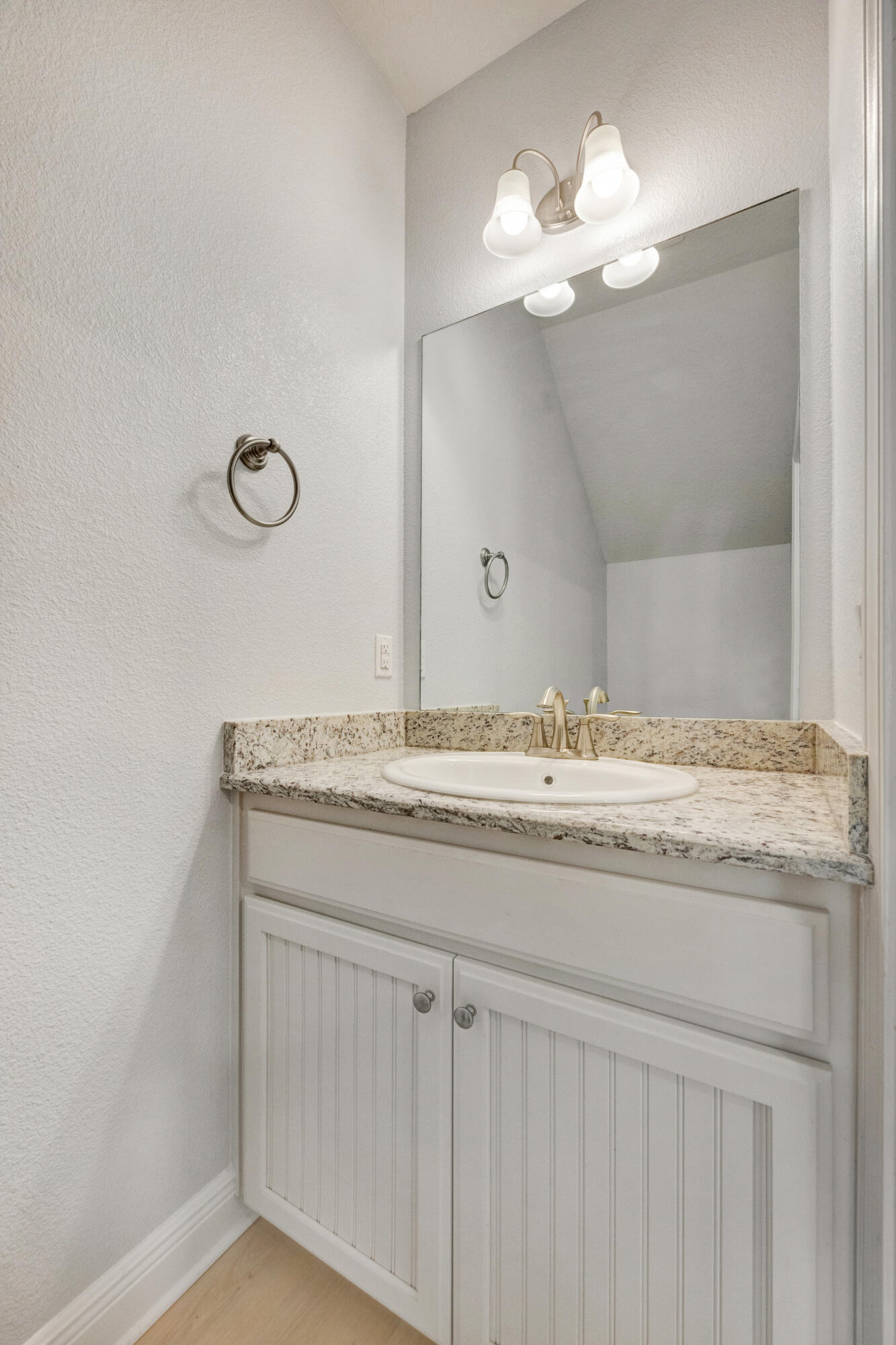 231 Baycliff Drive Crestview, FL 32536 - Photo 16 of 49 a bathroom with a granite countertop sink a mirror and vanity
