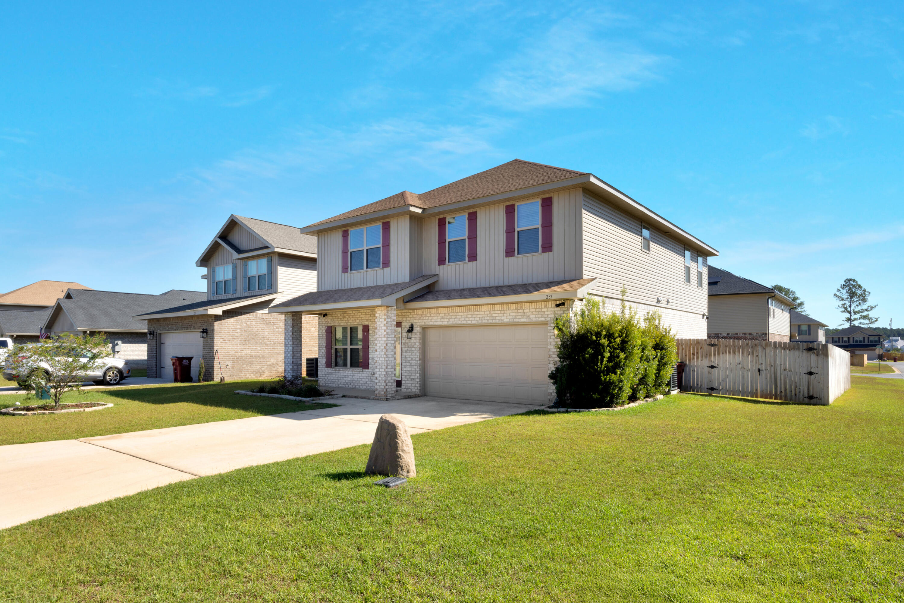 231 Baycliff Drive Crestview, FL 32536 - Photo 40 of 49 a front view of a house with a yard