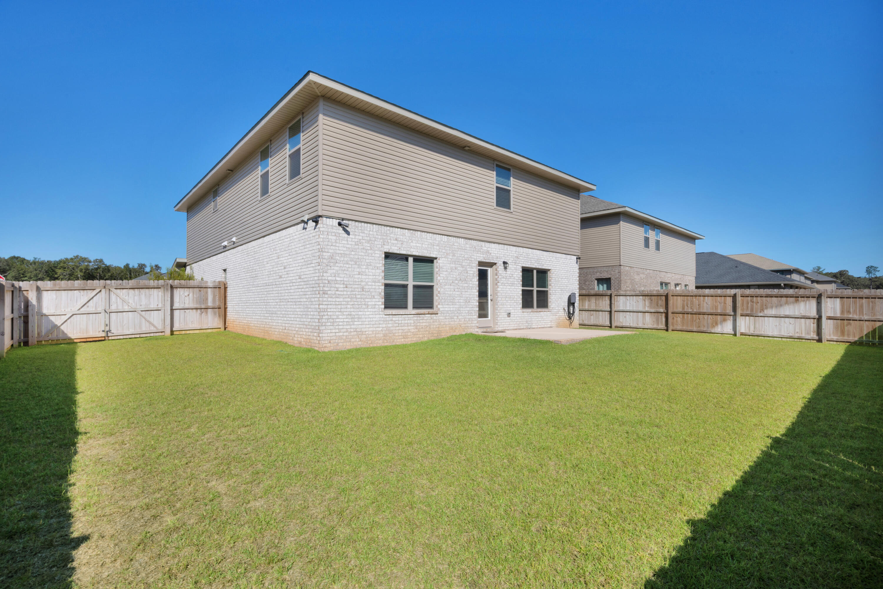 231 Baycliff Drive Crestview, FL 32536 - Photo 44 of 49 a view of a house with a backyard