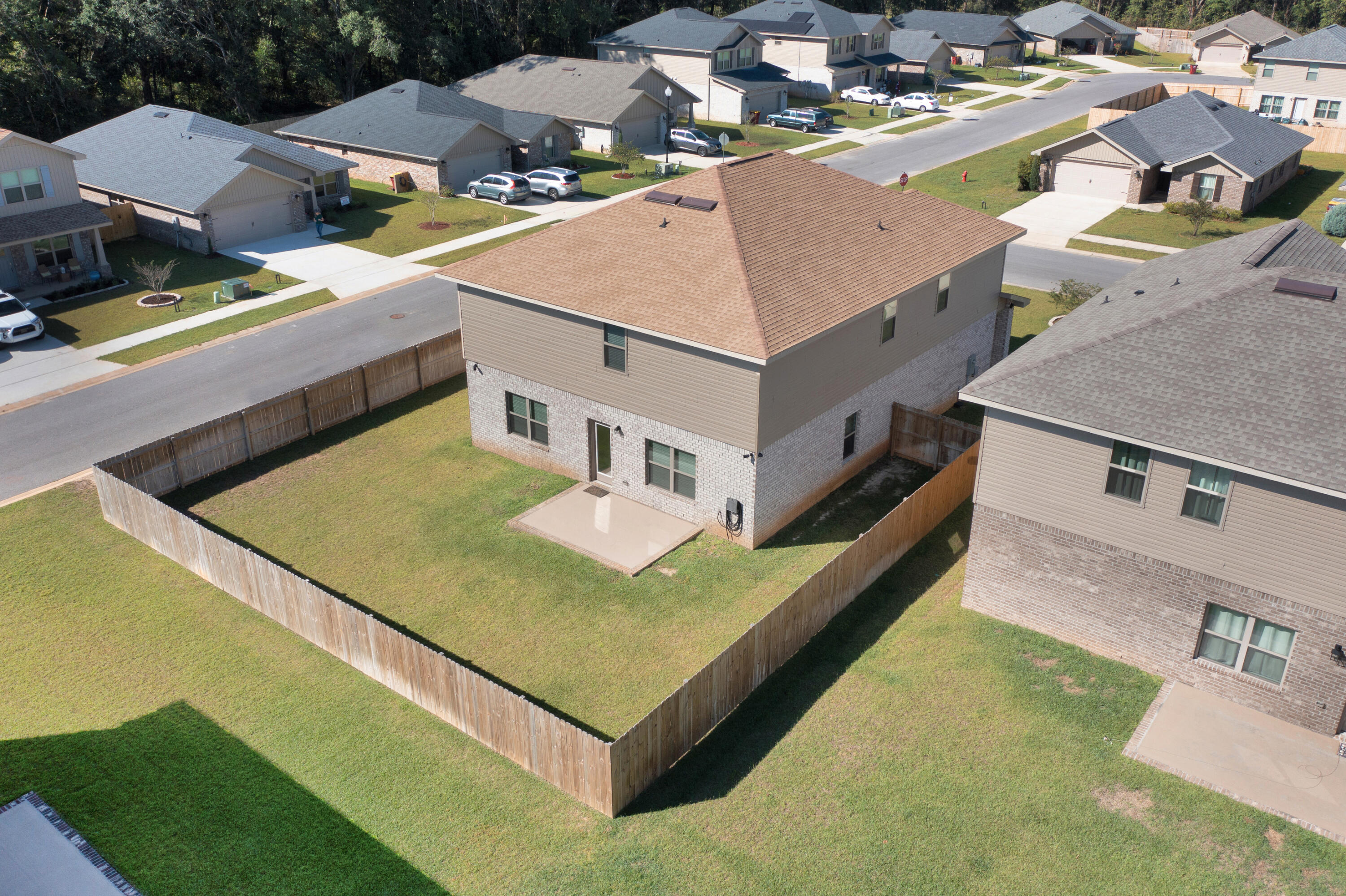 231 Baycliff Drive Crestview, FL 32536 - Photo 48 of 49 an aerial view of residential houses with outdoor space