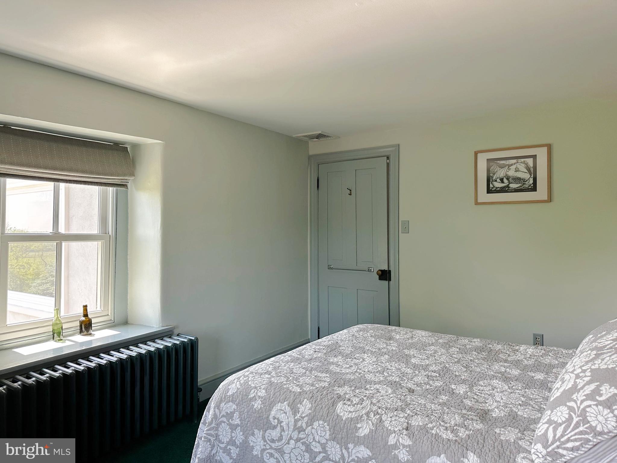 2382 Bergey Road Harleysville, PA 19438 - Photo 49 of 52 a bedroom with a bed and a window