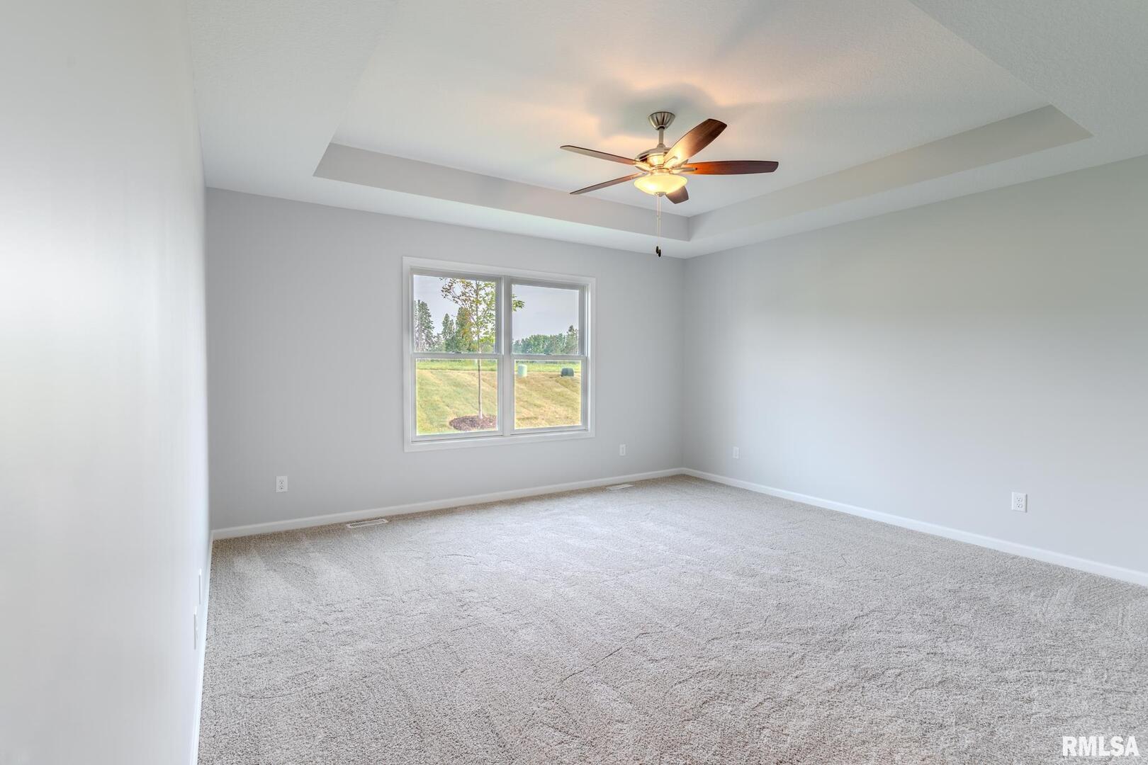 941 9th Avenue North Clinton, IA 52732 - Photo 14 of 24 an empty room with windows and fan