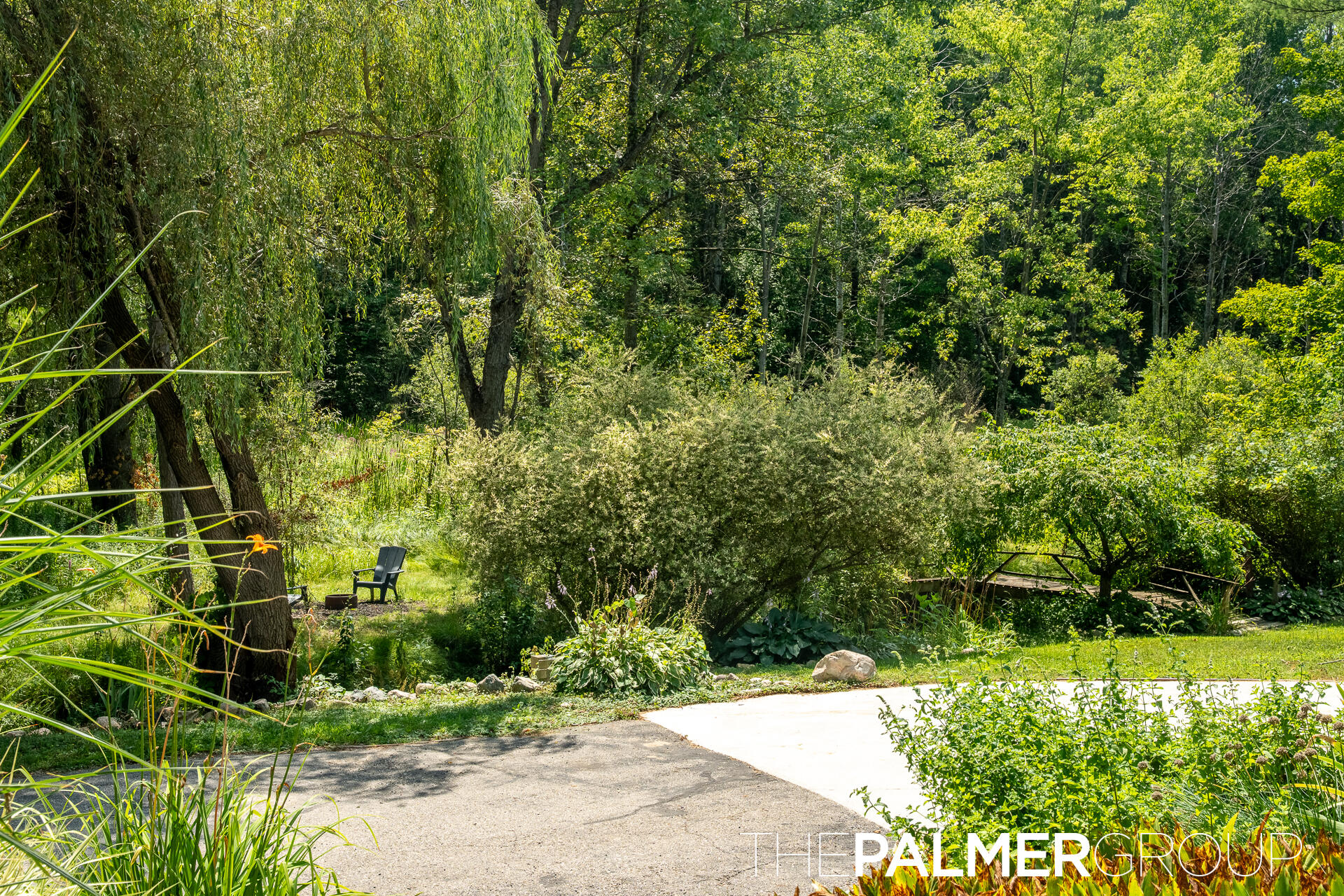 23419 22 Mile Road Paris, MI 49338 - Photo 40 of 53 Creek with walking bridge