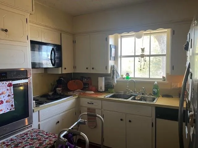 a picture of a living room with furniture