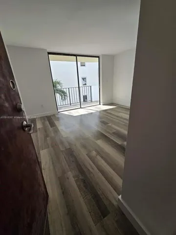 wooden floor with staircase