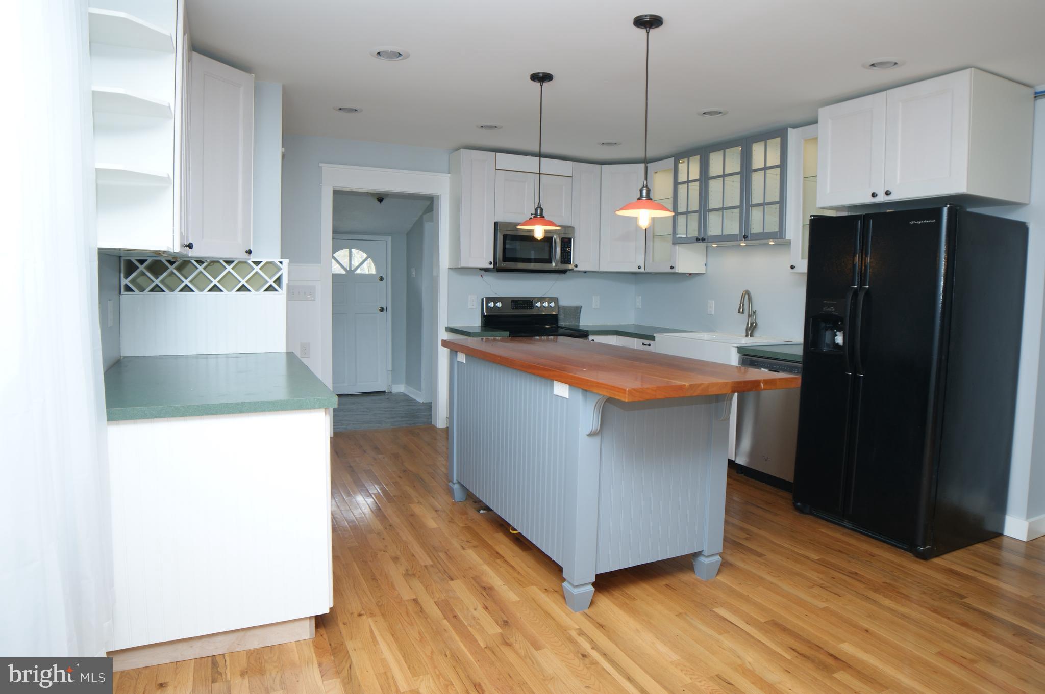 24678 Maddox Road Chaptico, MD 20621 - Photo 3 of 39 Kitchen w/ Island and Wine Rack