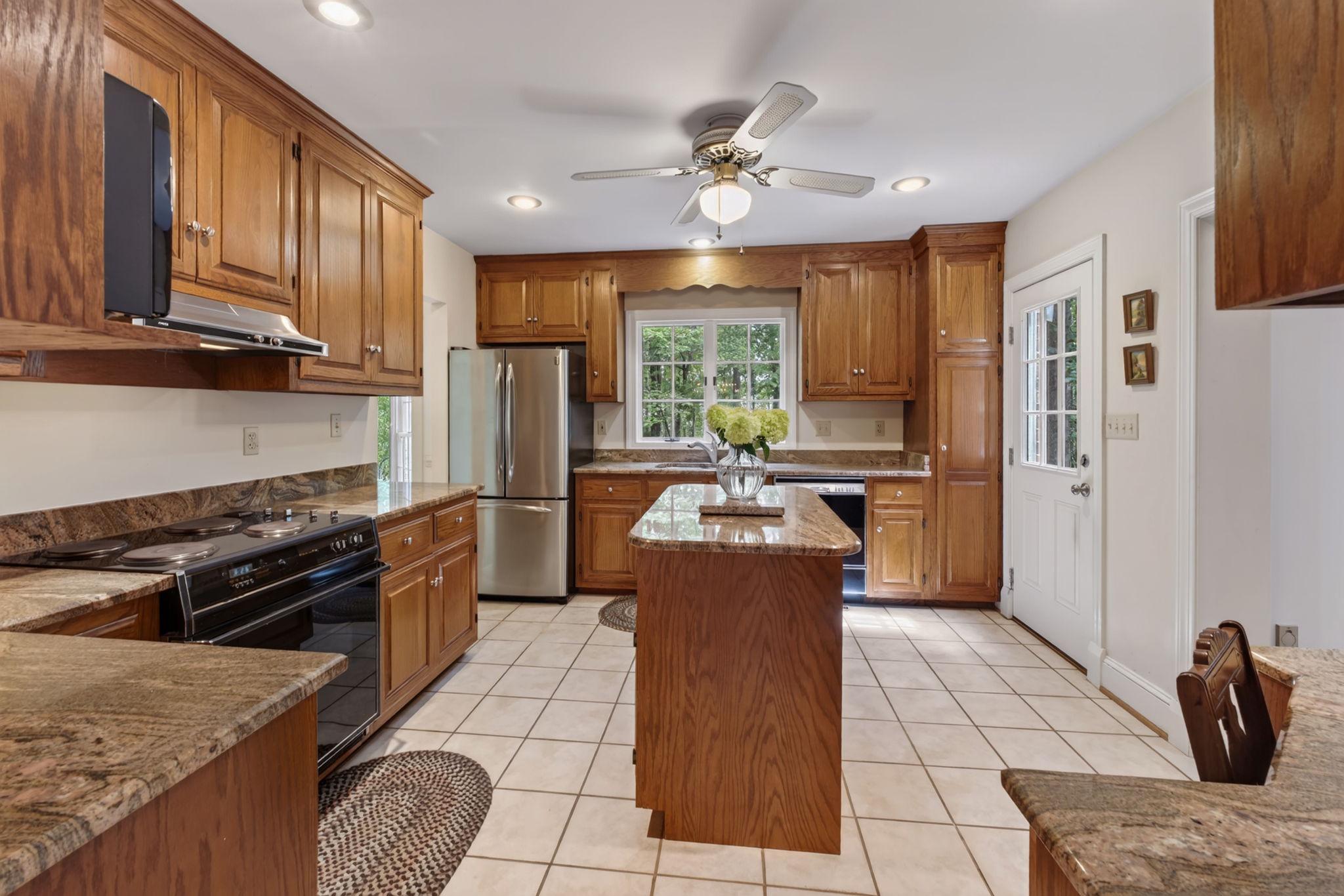 7501 Moormont Road Rapidan, VA 22733 - Photo 12 of 76 Warm and inviting kitchen space.