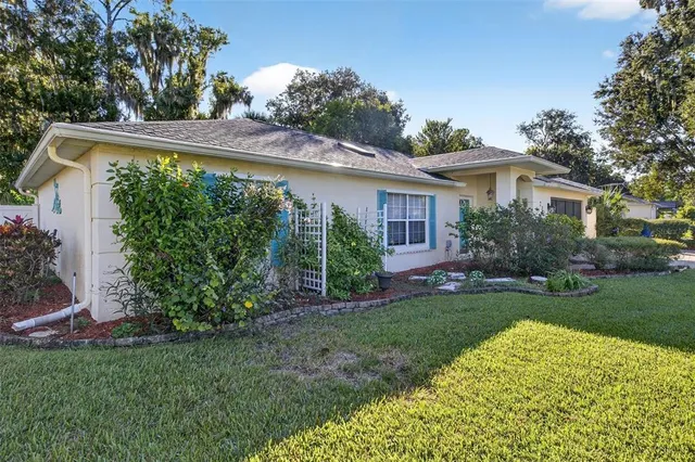 a view of a house with a garden